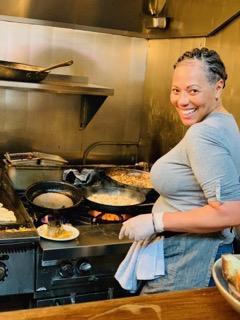 Chef Nina cooking in the kitchen