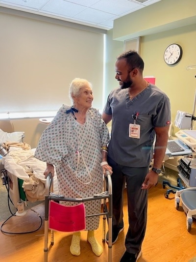 Virginia Burrow with occupational therapist, Joshua Victor