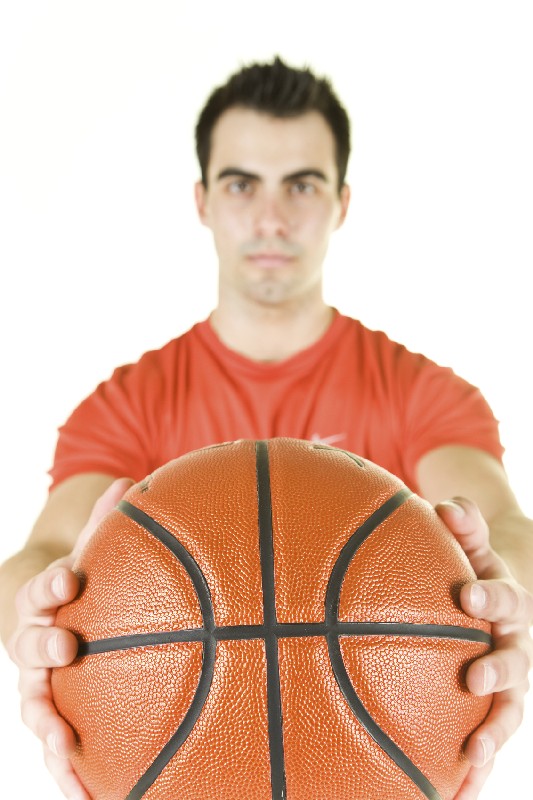 man holding basketball