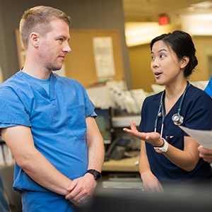 Nursing Careers: Image of nurses talking at a nurses station