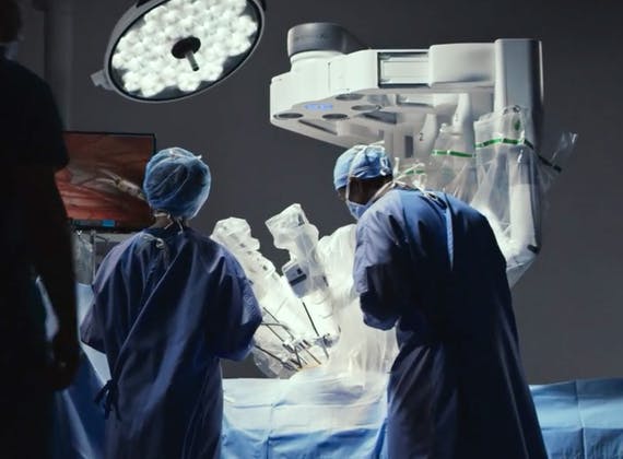 Surgeons In Operating Room Davinci System