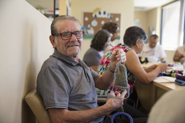 Senior male in a crafts class